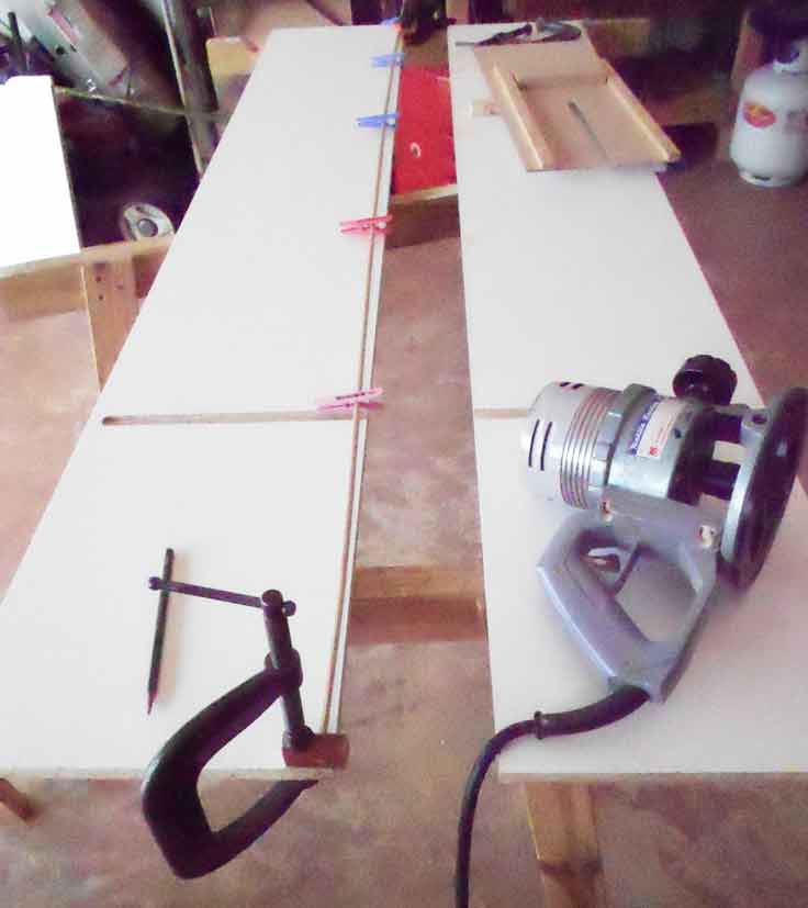 In this photo, I am marking out the position of the shelves using a story stick. Marking out the position of the shelves.